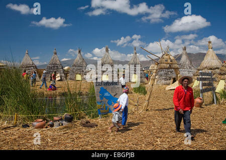 Uros on self-fashioned floating man-made islets, Peru, Titicaca, Puno Stock Photo