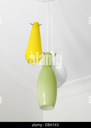 Vintage chandelier lamp hanged up on a white ceiling Stock Photo