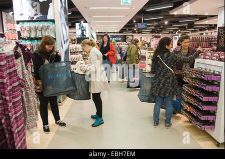 ENSCHEDE, NETHERLANDS -AUG 19, 2014: People are shopping in a new branch of warehouse Primark on the first day at the opening Stock Photo
