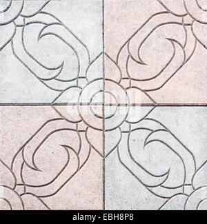 Flagstone walkway in Thai pattern of the city park. Stock Photo