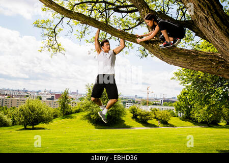Personal trainers doing outdoor training in urban place, Munich, Bavaria, Germany Stock Photo