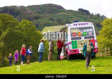 Tourists getting Ice Cream from Ice Cream Van. Rydal Show Rydal Hall Ambleside The Lake District Cumbria England UK Stock Photo