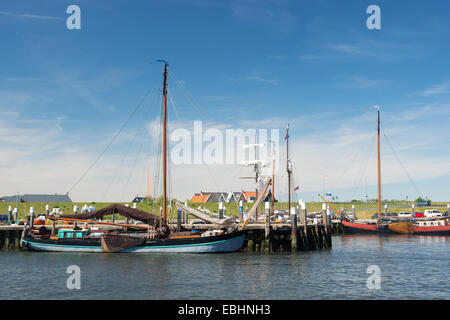 Small harbor in Oudeschild at Dutch wadden island Texel Stock Photo