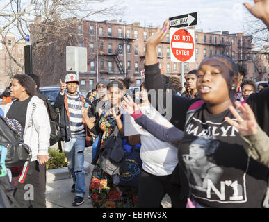 Boston, Massachusetts, USA. 1st Dec, 2014. Protesters react to a car horn on Commonwealth Ave during the hands up walk out protest on Monday, December 1, 2014. Credit:  Alena Kuzub/ZUMA Wire/ZUMAPRESS.com/Alamy Live News Stock Photo