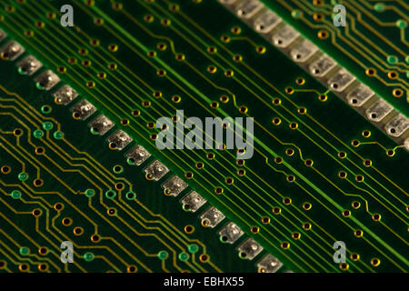 Electrical component parts of printed circuit boards at a macro level RAM surface mount technology golden printed conducting Stock Photo