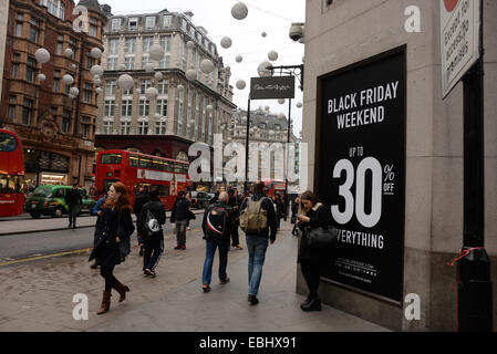 Black Friday sale signs in shop windows in Oxford Street, London Stock Photo