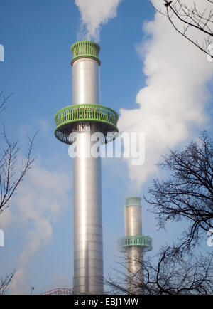 The two large exhaust stacks of the University of Alberta Heating Plant, a natural gas fired plant. Edmonton, Alberta, Canada. Stock Photo