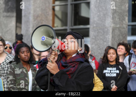 Amherst, Massachusetts, USA. 1st December, 2014. A woman speaks at the 'Hands Up, Walk Out' protest at the University of Massachusetts Amherst, Amherst, Massachusetts, USA, on Monday, December 1, 2014. Credit:  Susan Pease/Alamy Live News Stock Photo