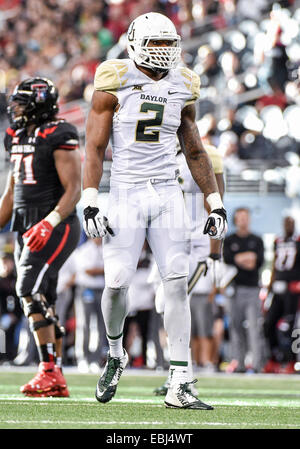 Baylor defensive end Shawn Oakman, left, rushes against Oklahoma State