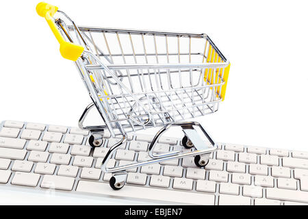 shopping cart on computer keyboard Stock Photo