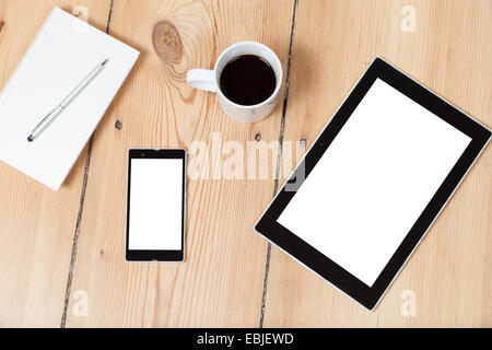 tablet and smartphone and book on wooden floor Stock Photo