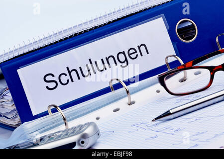 folder and documents of a seminar for further qualification Stock Photo