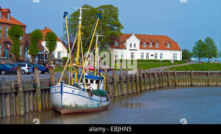 old fishing trawler in harbour, Germany, Schleswig-Holstein, Dithmarschen, Toenning Stock Photo