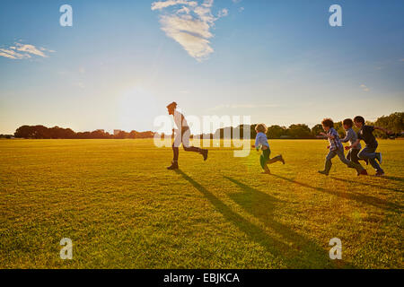 Family enjoying outdoor activities in the park Stock Photo