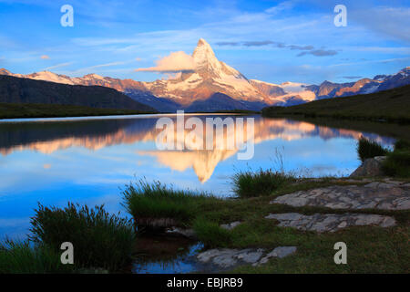 Matterhorn mirroring in lake Stellisee at sunrise, Switzerland, Valais