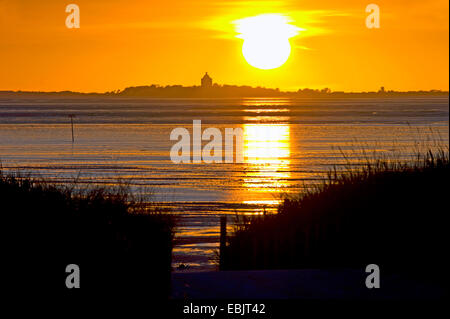 sunset in Wadden Sea near Cuxhaven Sahlenburg. view to island Neuwerk, Germany, Lower Saxony, Cuxhaven Stock Photo