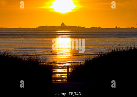 sunset in Wadden Sea near Cuxhaven Sahlenburg. view to island Neuwerk, Germany, Lower Saxony, Cuxhaven Stock Photo