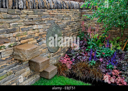 The planted border with mixed planting including Heuchera and Salvia in the Peak Reflections garden Stock Photo