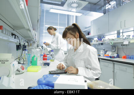 Biology lab technicians at work Stock Photo