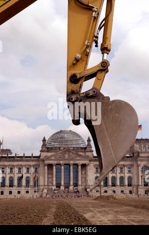 mechanical shovel excavator in front of the Reichstag in Berlin, Germany, Berlin Stock Photo