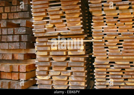 wooden boards stucked in a saw mill, Germany, Lower Saxony Stock Photo