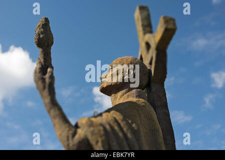 A statue of St. Aidan, created by the artist Kathleen Parbury in 1958, and erected in his honour on Lindisfarne (Holy Island), N Stock Photo