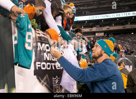 Dec. 1, 2014 - East Rutherford, Florida, U.S. - Miami Dolphins quarterback Ryan Tannehill (17) signs autographs before the game at MetLife Stadium in East Rutherford, New Jersey on December 1, 2014. (Credit Image: © Allen Eyestone/The Palm Beach Post/ZUMA Wire) Stock Photo