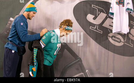 Dec. 2, 2014 - East Rutherford, Florida, U.S. - Miami Dolphins quarterback Ryan Tannehill (17) signs a fans jersey at MetLife Stadium in East Rutherford, New Jersey on December 1, 2014. (Credit Image: © Allen Eyestone/The Palm Beach Post/ZUMA Wire) Stock Photo