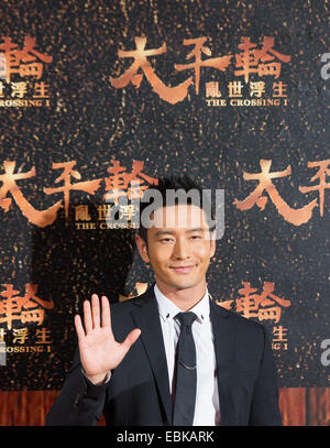 Taipei's Taiwan. 2nd Dec, 2014. Chinese actor Huang Xiaoming attends the premiere of The Crossing I as a starring role in Taipei, southeast China's Taiwan, Dec. 2, 2014. © Shen Hong/Xinhua/Alamy Live News Stock Photo