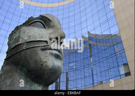 modern bust in classical style in front of a glass cladding reflecting high-rise office buildings of La D�fense, France, Paris Stock Photo