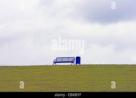 bench and dust bin on the North Sea dyke, Germany, Lower Saxony, Cuxhaven Stock Photo