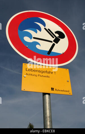 warning sign of flood wave, Germany, North Rhine-Westphalia Stock Photo