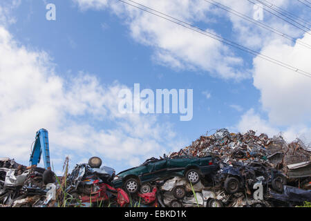 Scrap yard with cars and metal Stock Photo