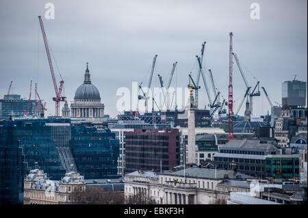 London, UK. 2nd December, 2014. View on St Paul's Cathedral, Monument and construction cranes seen from Tower Bridge Credit:  Piero Cruciatti/Alamy Live News Stock Photo
