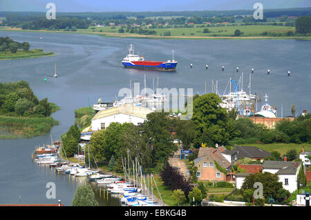 view from the steeple of St. Peter's Church to cargo ship on Peenestrom, Germany, Mecklenburg-Western Pomerania, Wolgast Stock Photo