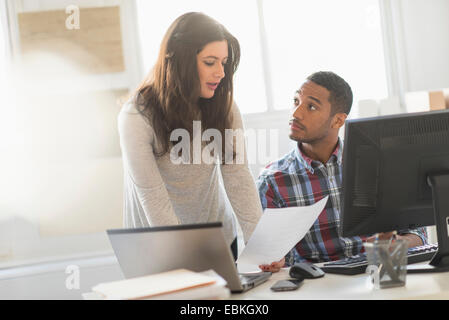 Business couple working in office Stock Photo