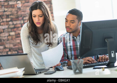 Business couple working in office Stock Photo