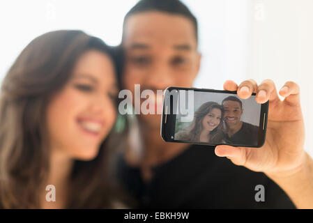 Happy couple taking selfie Stock Photo