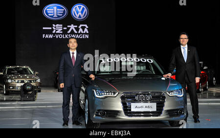 Changchun, China's Jilin Province. 2nd Dec, 2014. A ceremony is held to mark the 10,000,000th car produced by FAW-Volkswagen, a new Audi A6L, in Changchun, capital of northeast China's Jilin Province, Dec. 2, 2014. Credit:  Wang Haofei/Xinhua/Alamy Live News Stock Photo