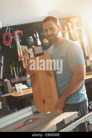 Man working in workshop Stock Photo