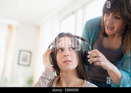 Mom yelling at teenage daughter (14-15) Stock Photo