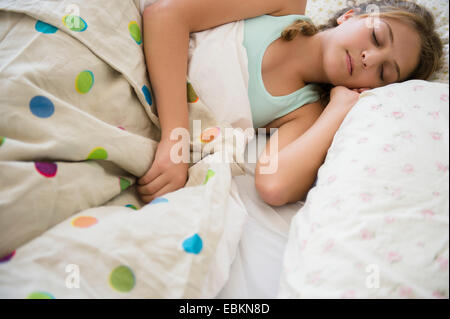 Girl (12-13) sleeping Stock Photo