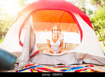 USA, Florida, Tequesta, Portrait of woman sitting in tent Stock Photo