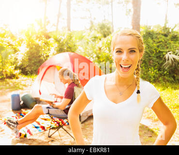 USA, Florida, Tequesta, Portrait of smiling woman and man reading book Stock Photo