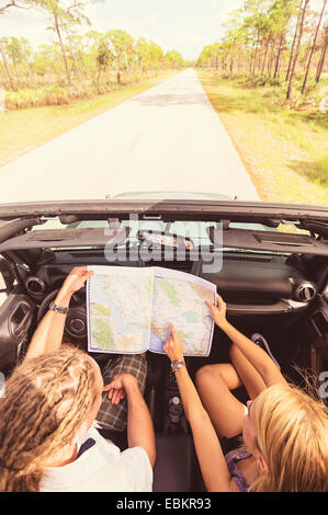 USA, Florida, Tequesta, Couple checking map while driving Stock Photo