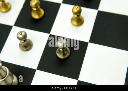 Classic chess game - pieces in play on chessboard Stock Photo