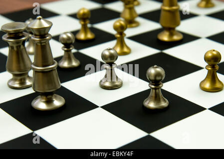 Classic chess game - pieces in play on chessboard Stock Photo