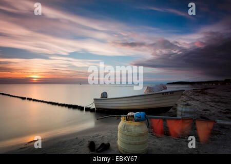 fishing boat and spur dike at Baltic Sea in evening light, longtime exposure, Germany, Mecklenburg-Western Pomerania, Hiddensee, Dornbusch Stock Photo