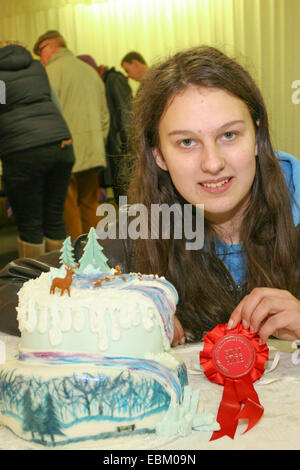 Melton Mowbray, Leicestershire, UK. 2nd Dec 2014. 15 years old Alice Featherstone from Markfield in Leicestershire, UK., won Best Cake with a Christmas theme at the Annual Melton Mowbray and Belvoir Fatstock Show Credit:  Jim Harrison/Alamy Live News Stock Photo