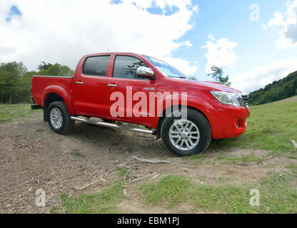 2012 Toyota Hilux Invincible 4 wheel drive pick up truck driving off road Stock Photo